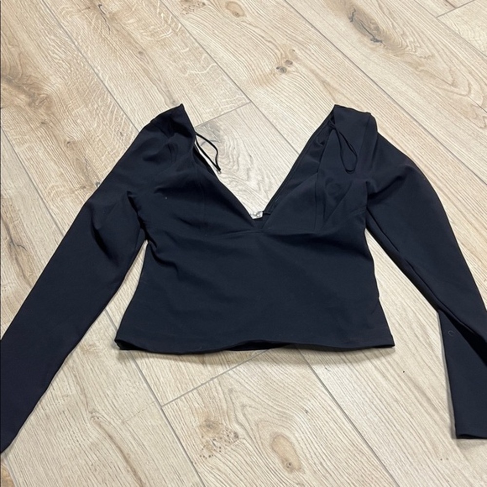 Free People x Intimately FP Duo Corset Long Sleeve Cami
Elegant black top with